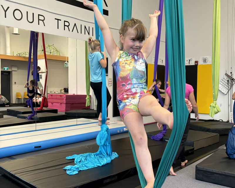 Young kid learning aerial